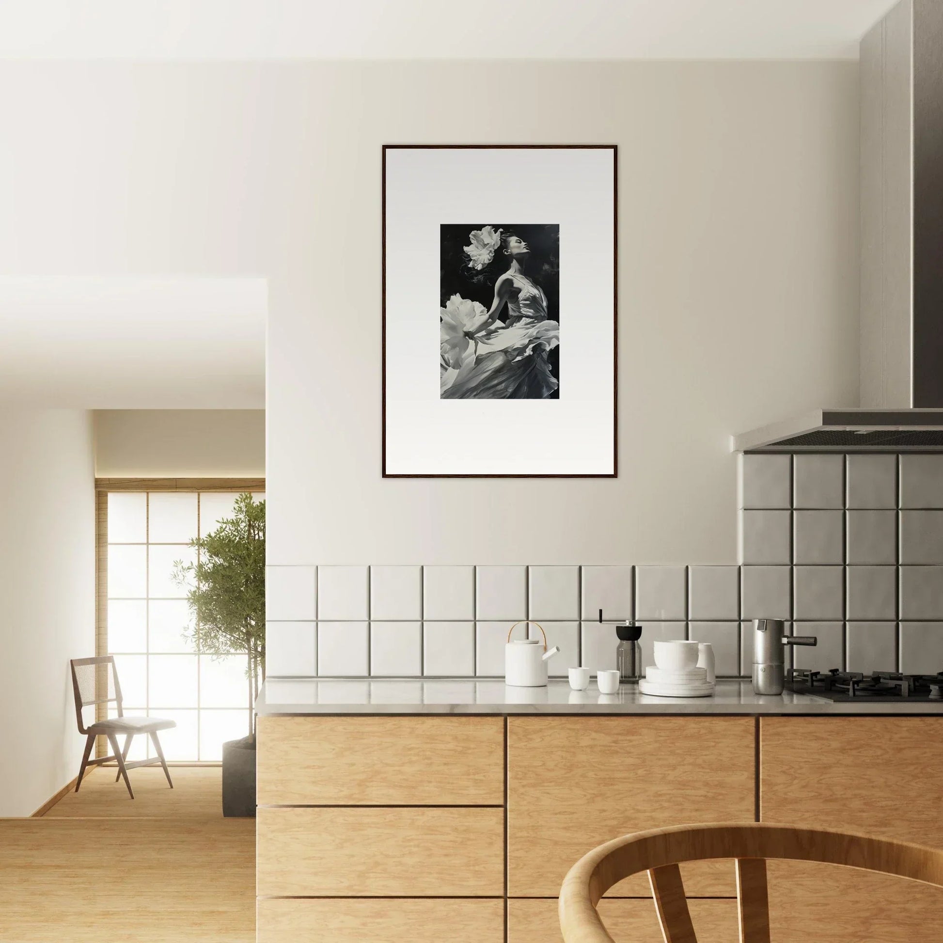 Framed black and white windswept reverie photograph above a kitchen counter for stylish room decoration