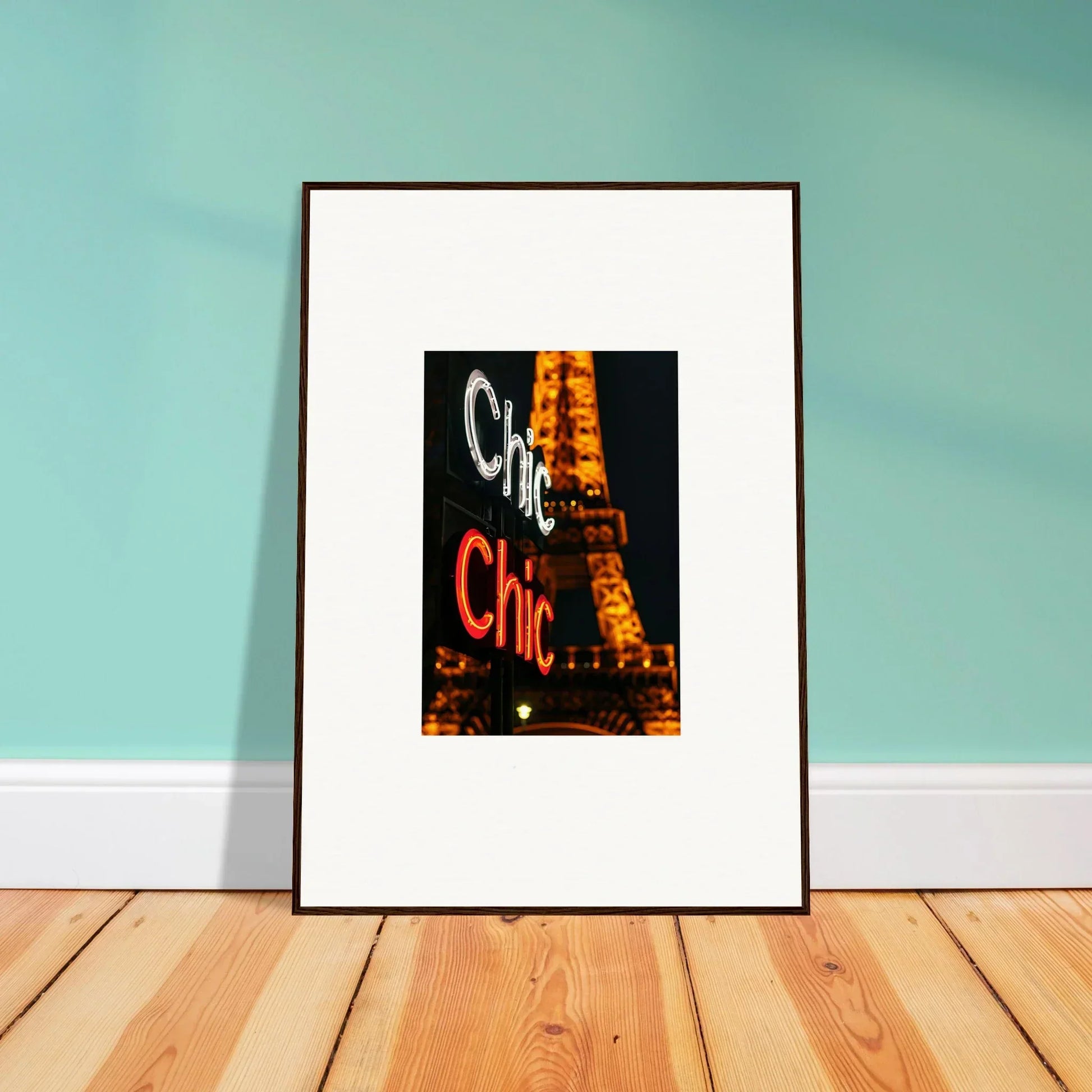 Framed wall art of the Eiffel Tower at night with Cafe Chic sign for cool room decoration