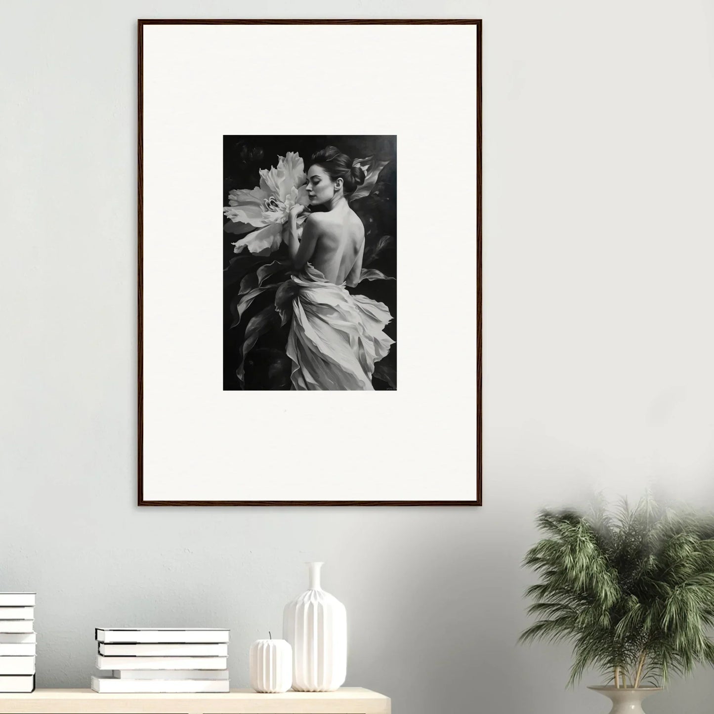 Framed black and white photo of a figure in fabric among flowers for Whispering Dream Echoes