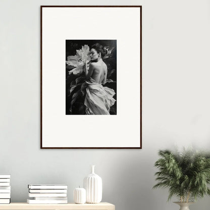 Framed black and white photo of a figure in fabric among flowers for Whispering Dream Echoes