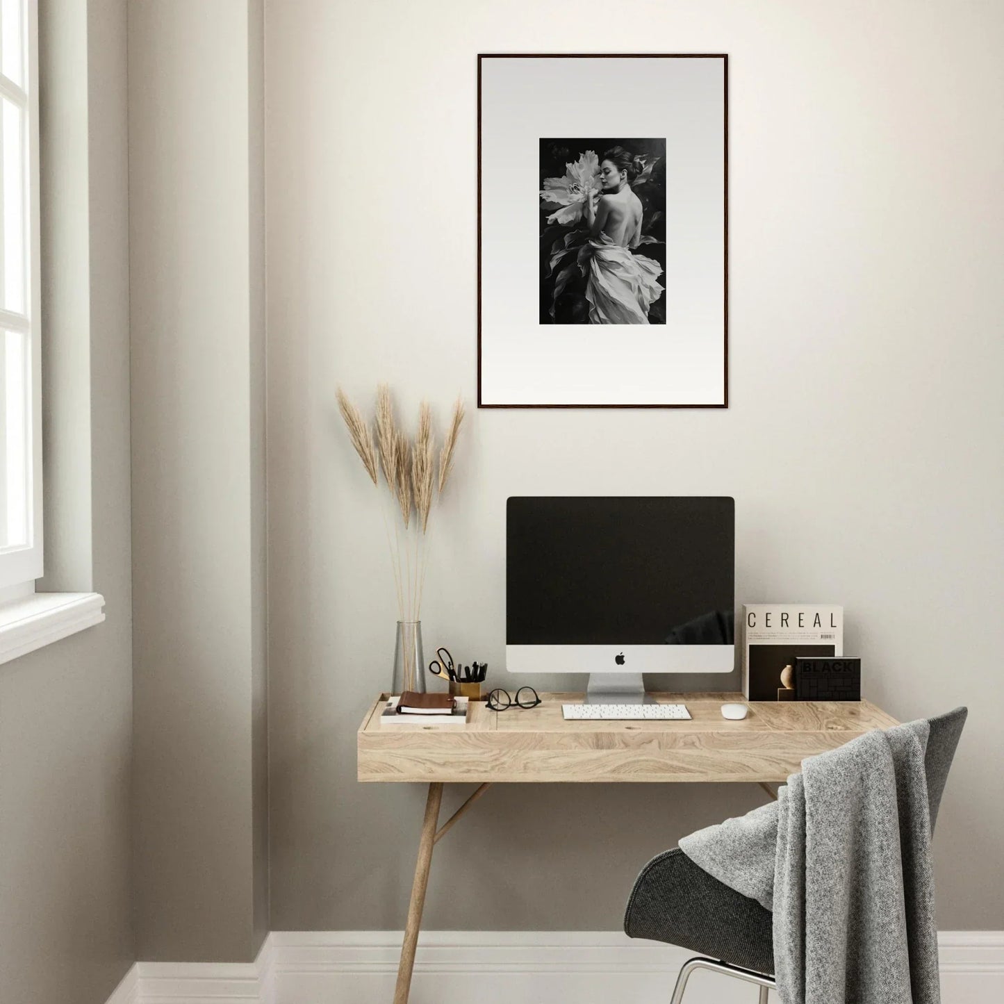 Minimalist wooden desk with computer and framed art for Whispering Dream Echoes