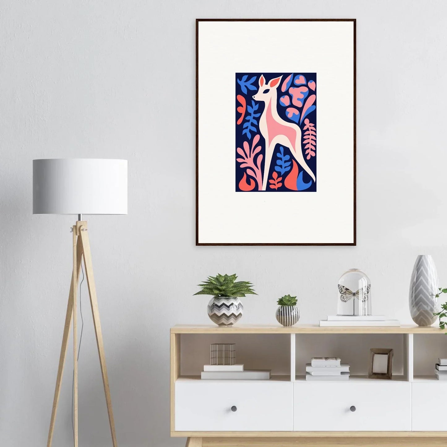 Framed wall art of a stylized deer with fawn flora and vibrant colors for room decor