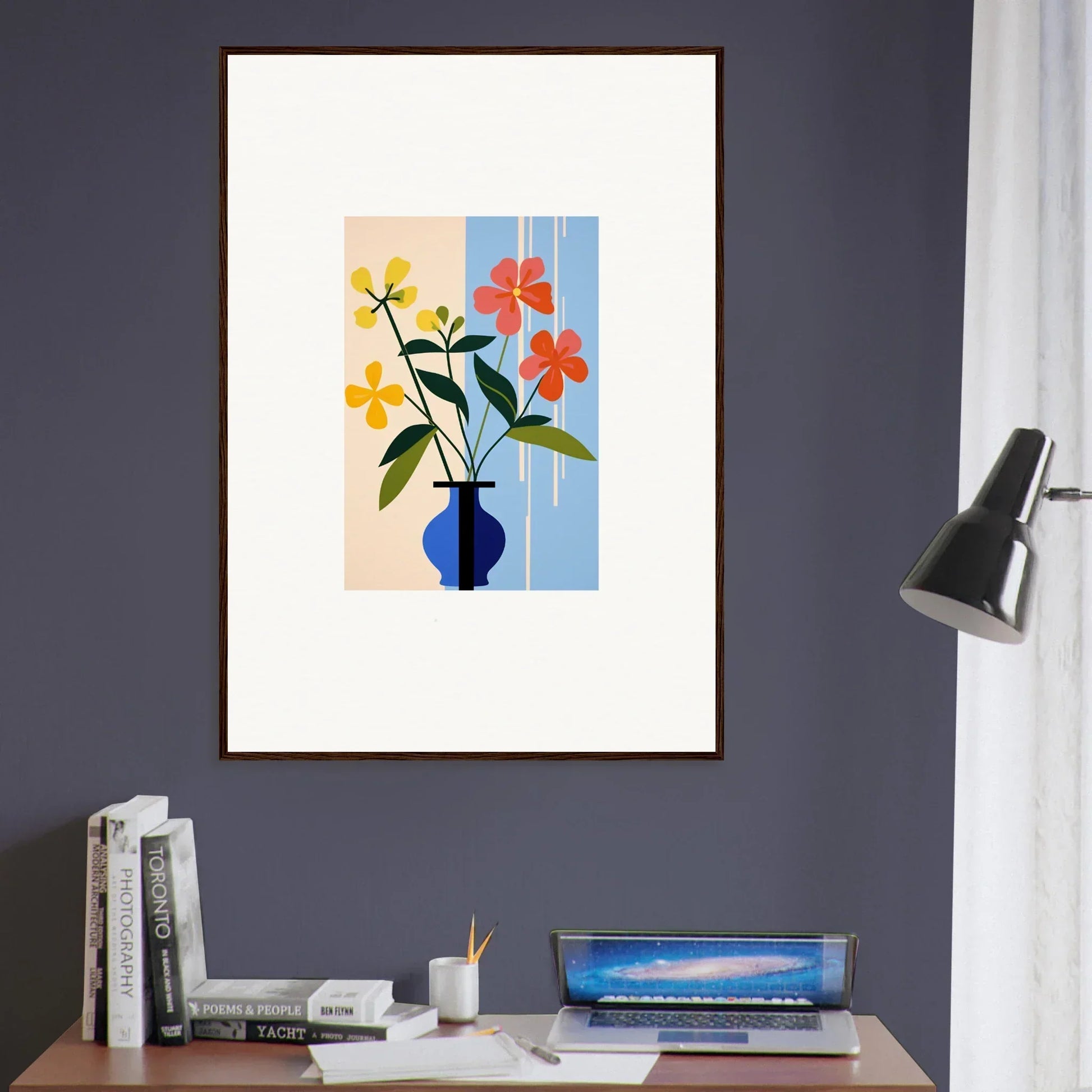 Framed wall art of colorful flowers in a blue vase for vibrant room decor