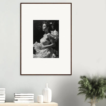 Framed black and white photo of a woman with flowers, perfect for room decoration