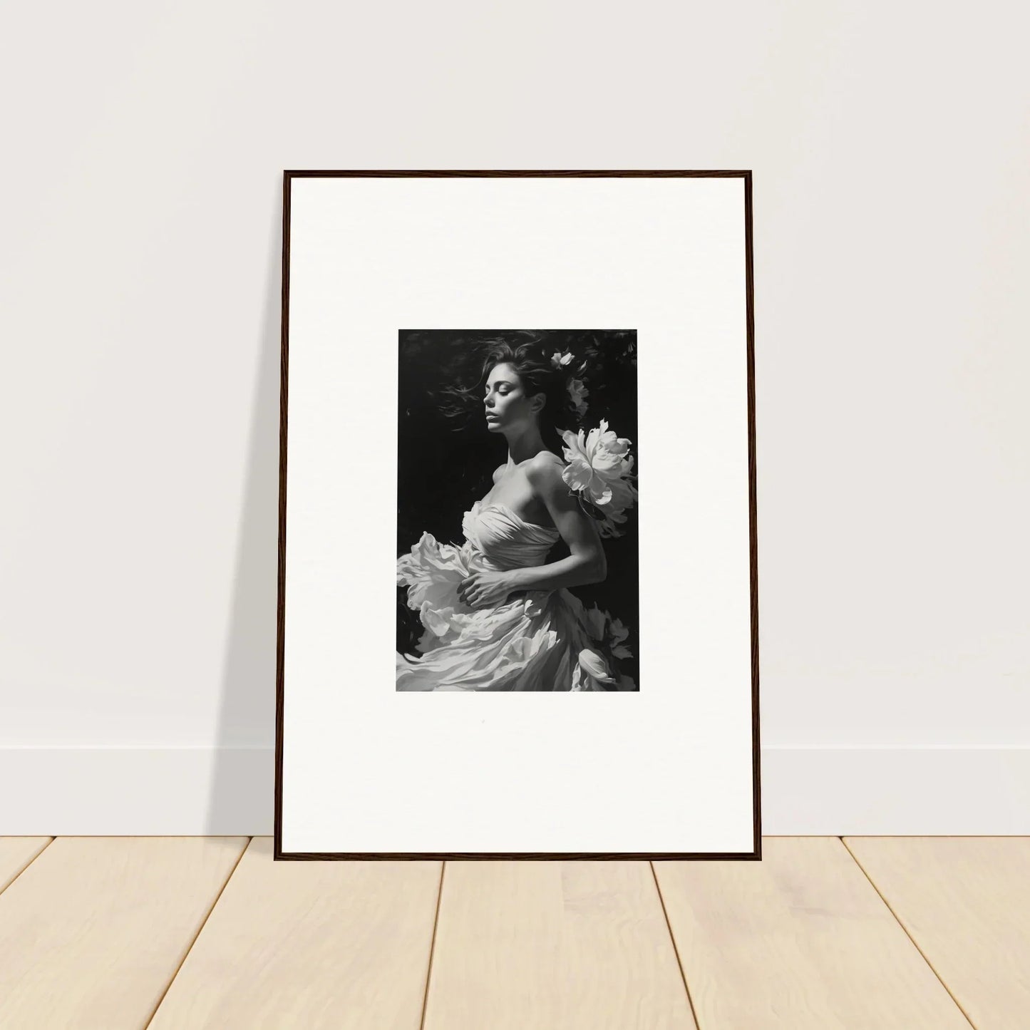 Framed black and white photo of a woman in an elegant dress, perfect for room decoration