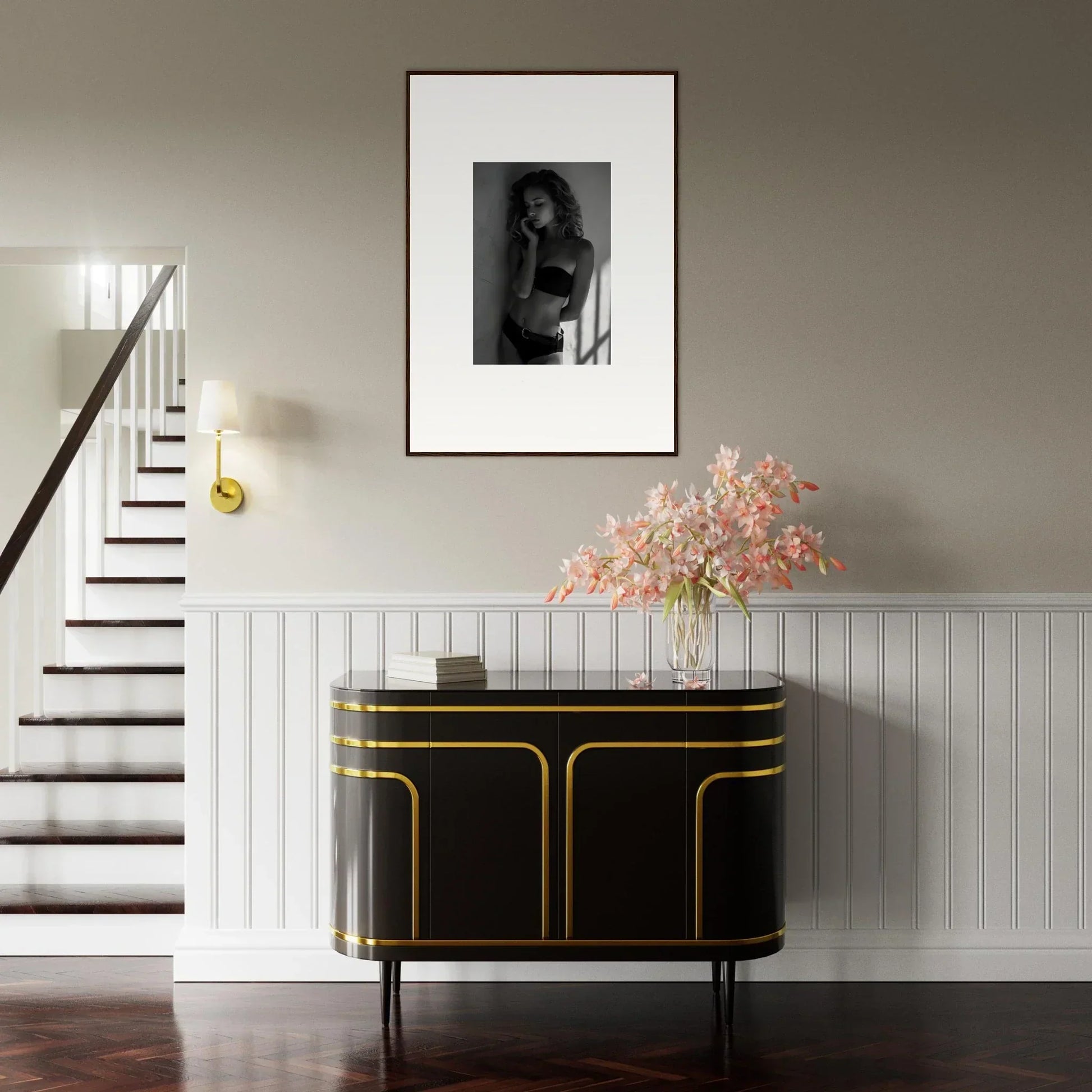 Elegant black sideboard with gold trim and curved edges.