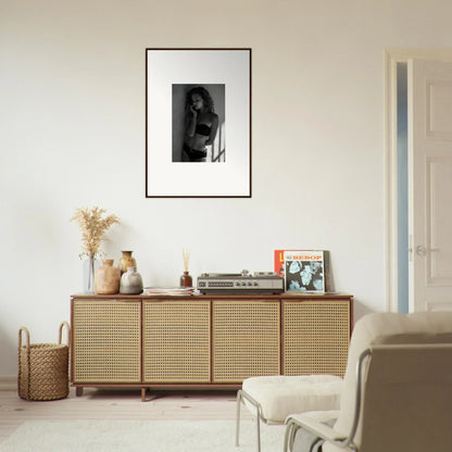 Wooden sideboard with cane-webbed doors and decorative items on top.