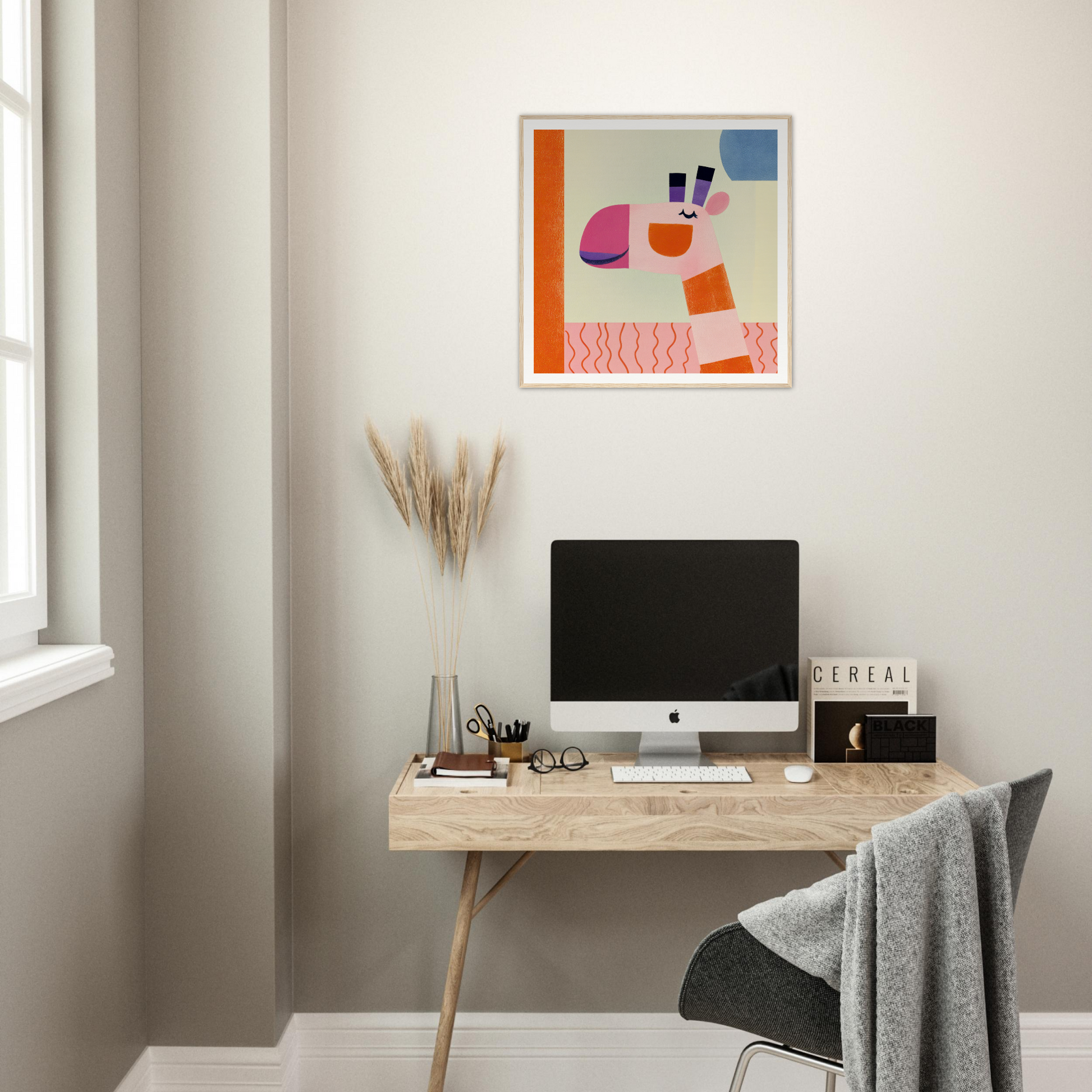 Minimalist wooden desk with iMac and Dreamy Giraffe Reverie artwork above