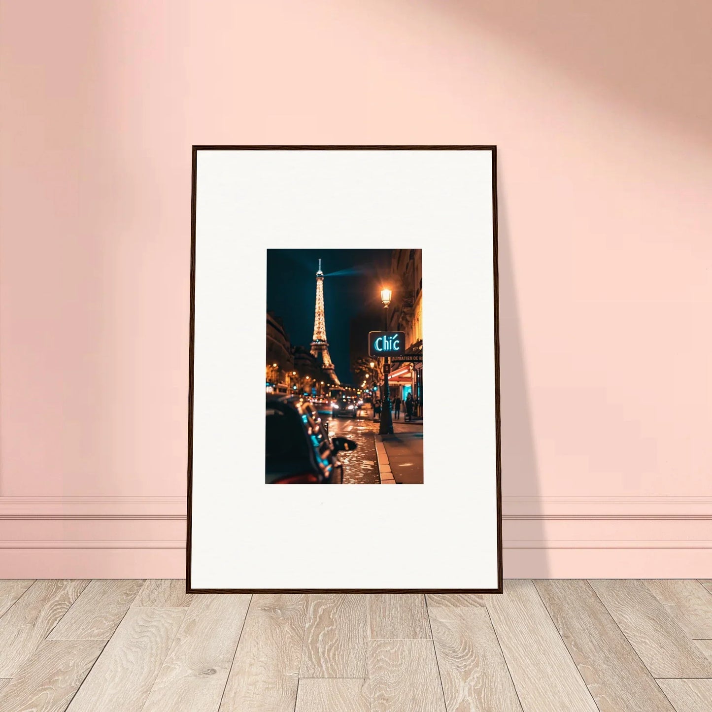 Framed wall art of a dreamy Paris street scene with the Eiffel Tower at night