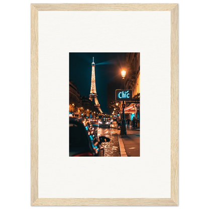 Framed wall art of a Paris street scene with the glowing Eiffel Tower for room decoration