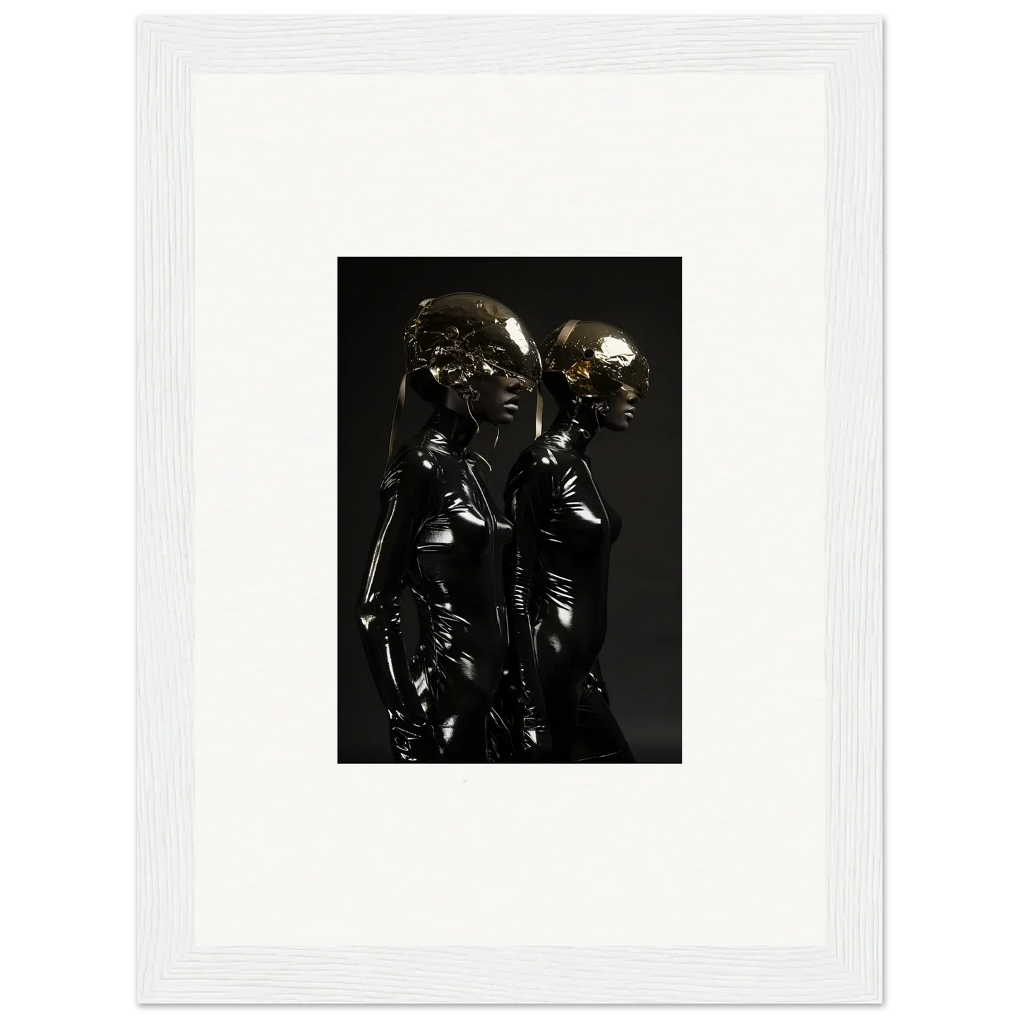 Metallic sculpture depicting two intertwined figures with smooth, reflective surfaces.