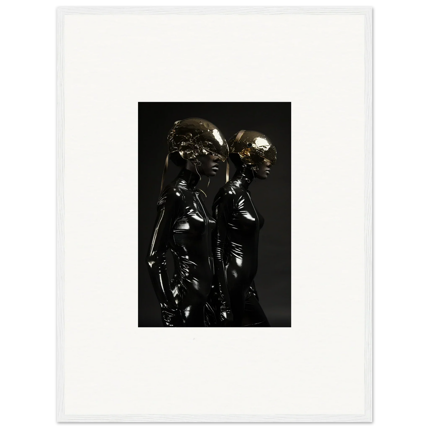 Dark metallic sculpture depicting two intertwined figures.