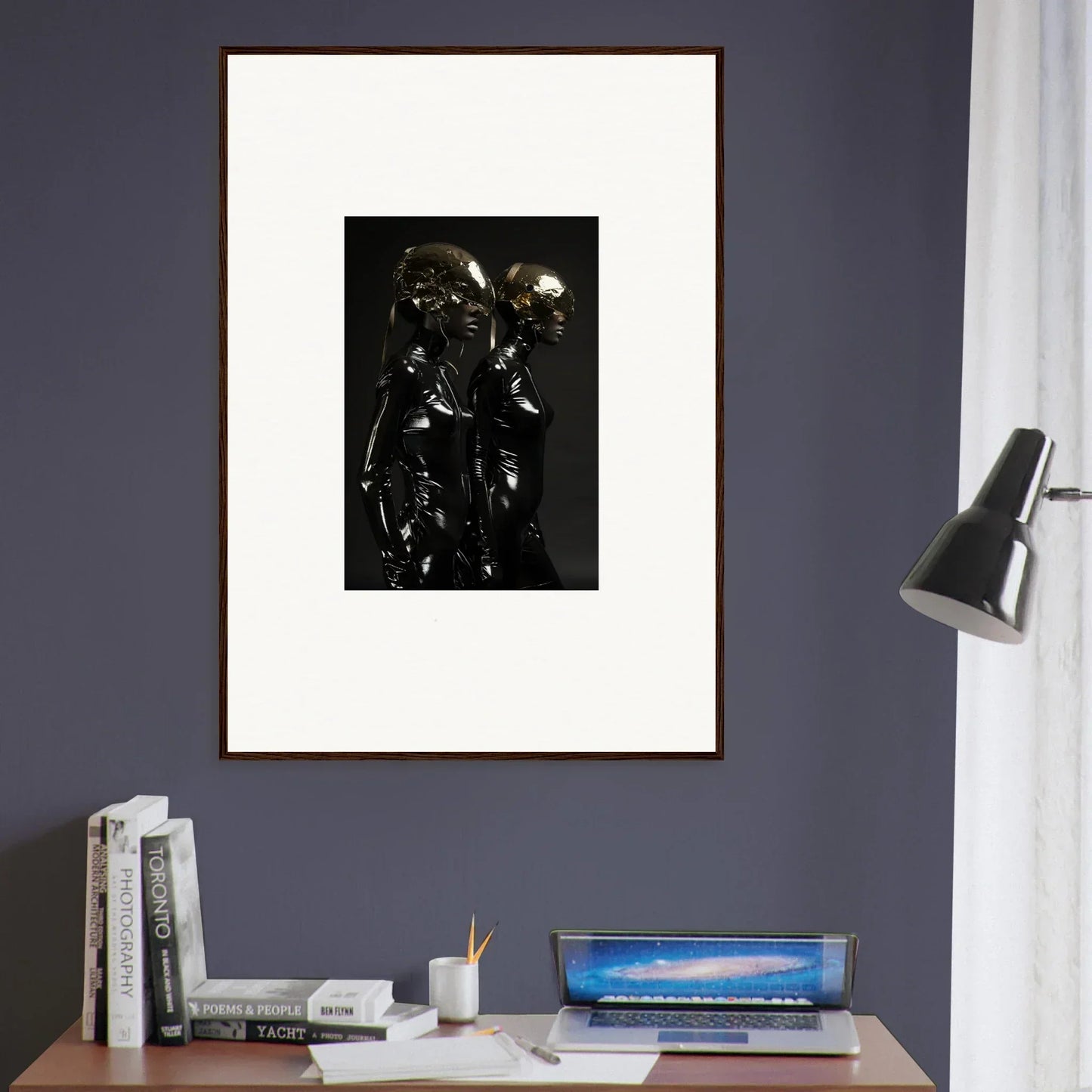 Framed black and white photograph of a metallic humanoid figure.