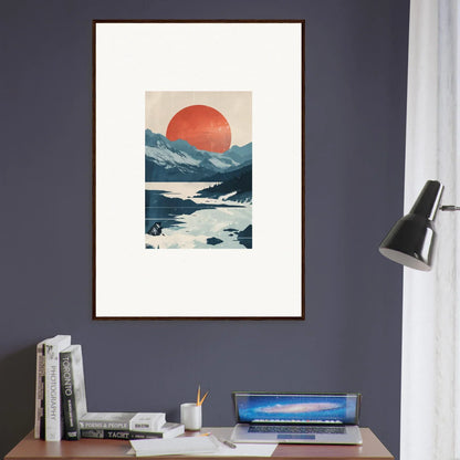 Framed canvas print of a minimalist landscape with mountains, water, and a red sun