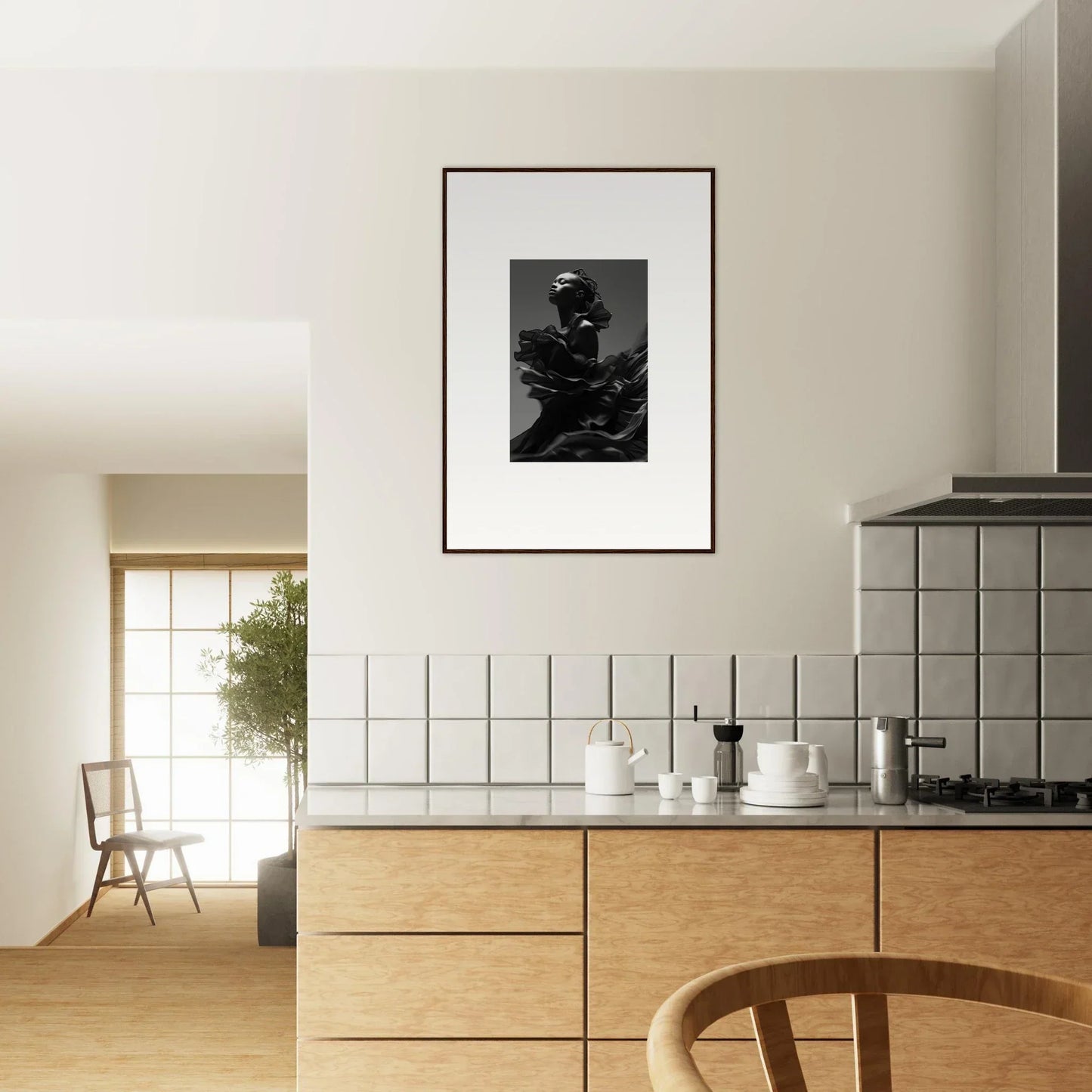 Modern kitchen with wooden cabinets, tiled backsplash, and framed black-and-white photograph on the wall.