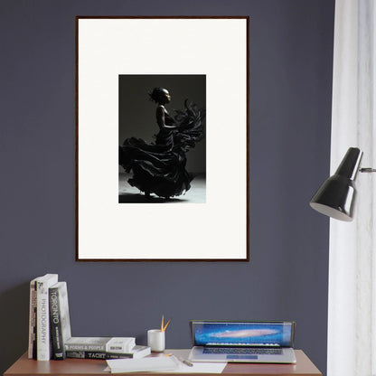 Framed black and white photograph of a flamenco dancer in motion.