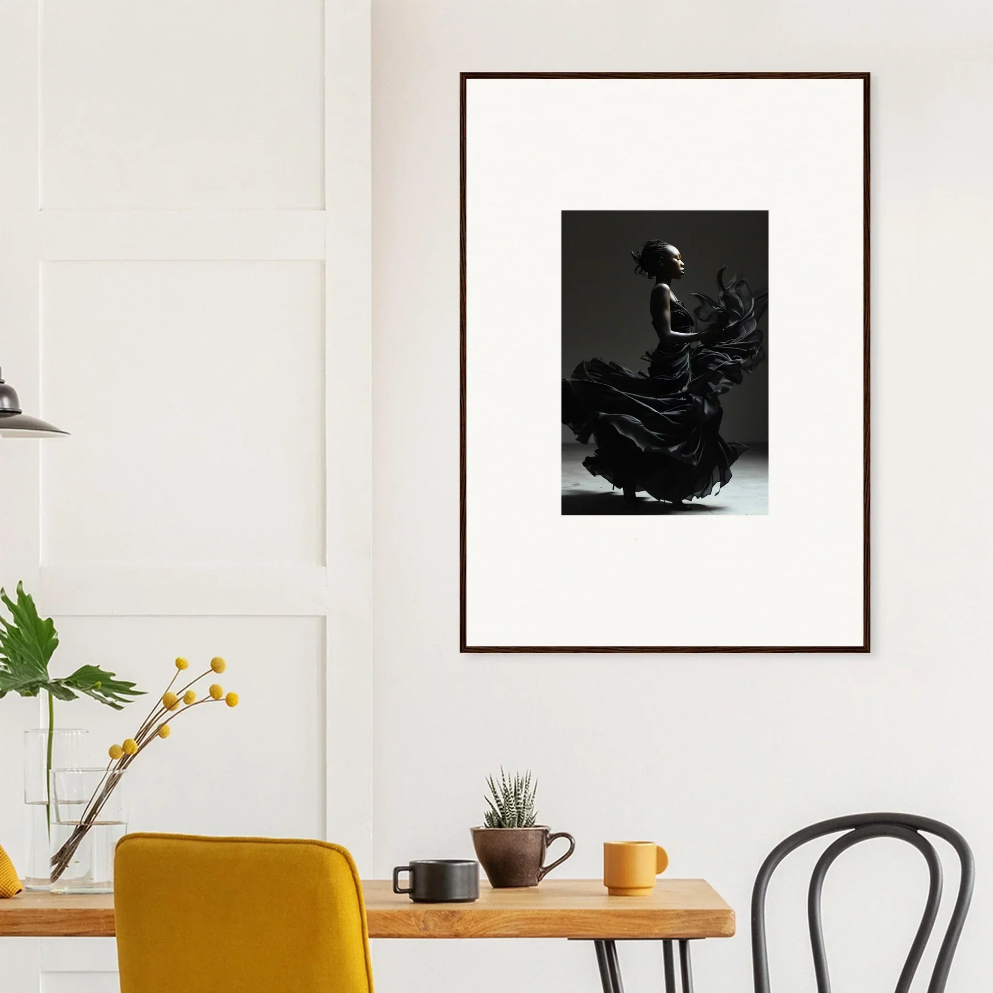 Framed black-and-white photograph of a flamenco dancer in motion.