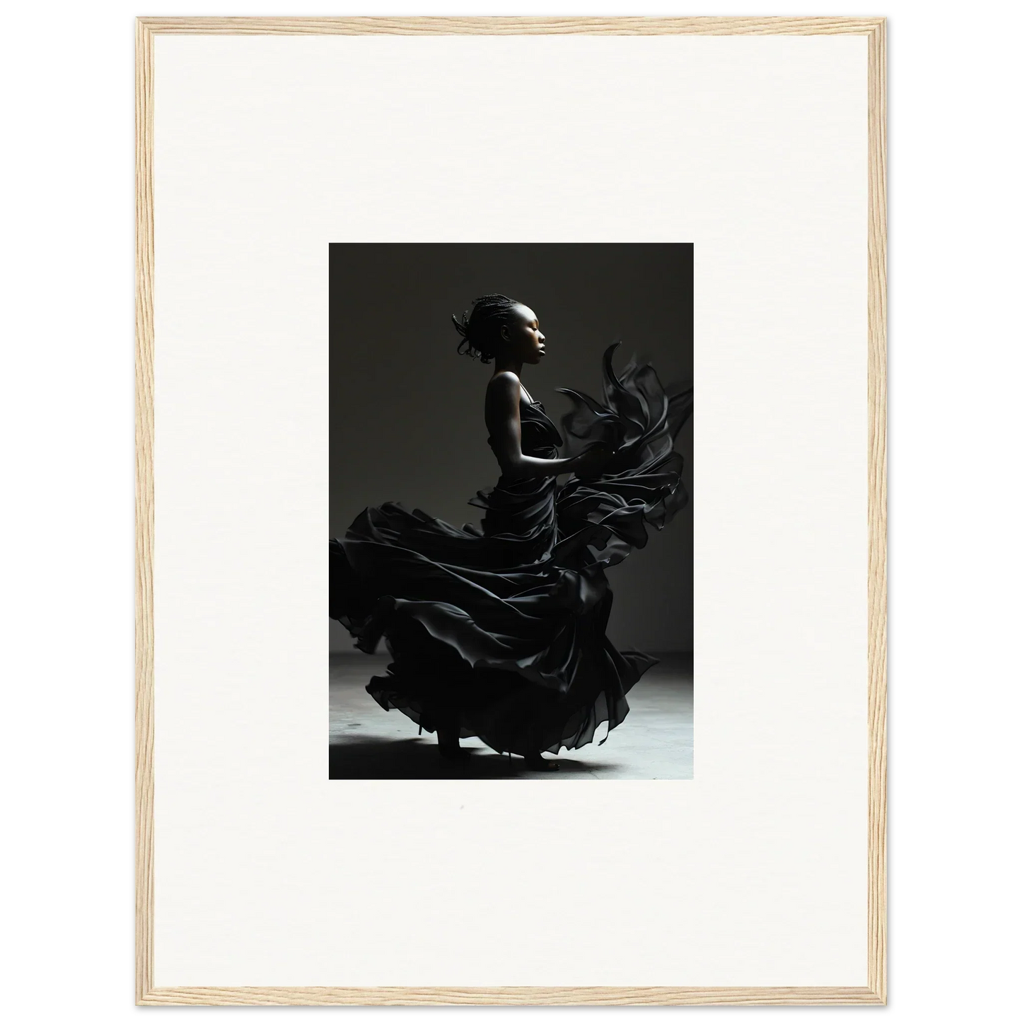 Silhouette of a flamenco dancer in a flowing dress, captured mid-motion.