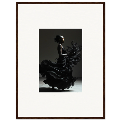 Silhouette of a flamenco dancer in a flowing dress captured mid-motion.