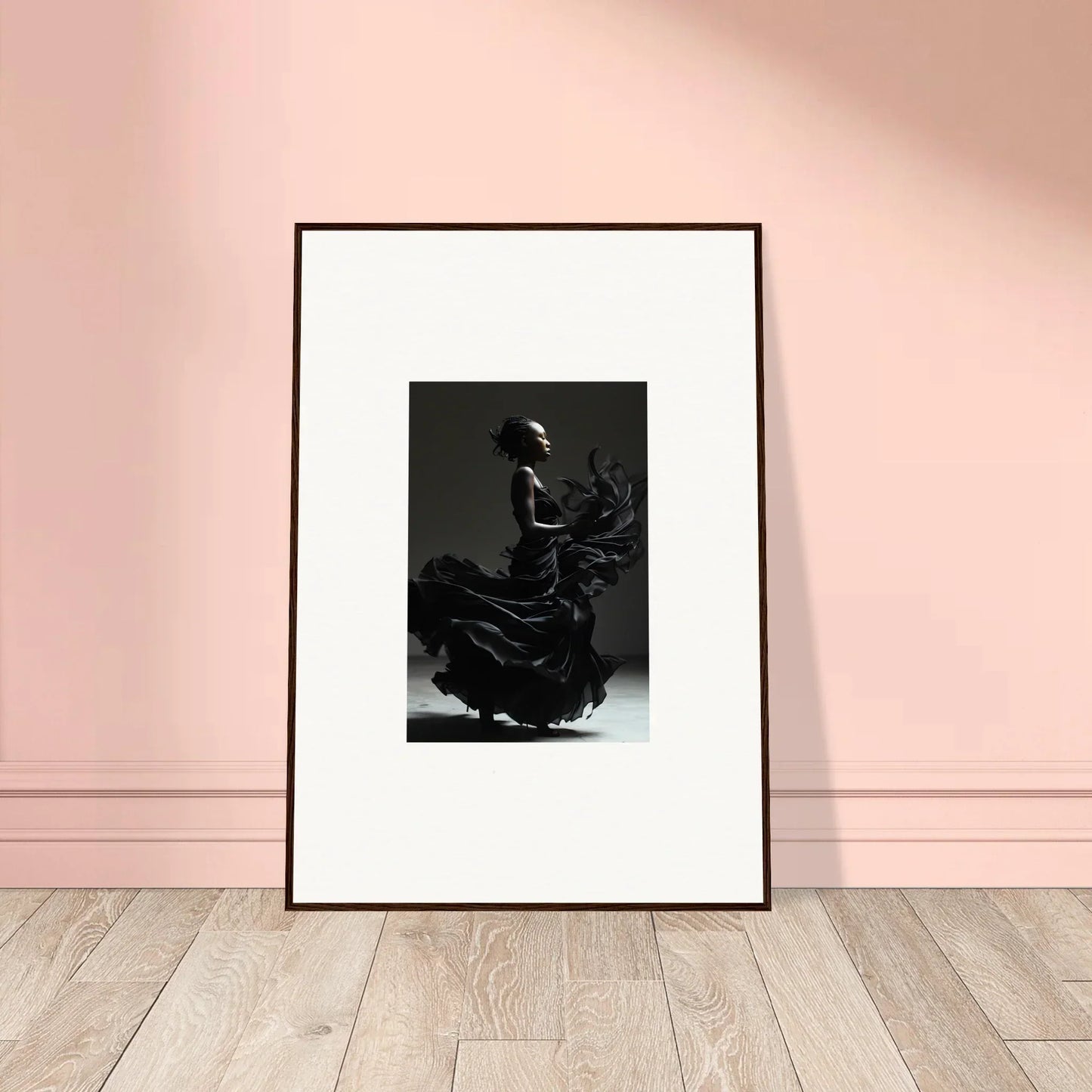 Framed black-and-white photograph of a flamenco dancer in motion.