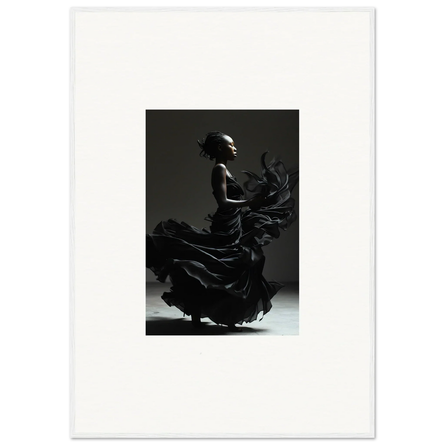 Silhouette of a flamenco dancer in a flowing dress, captured mid-movement.