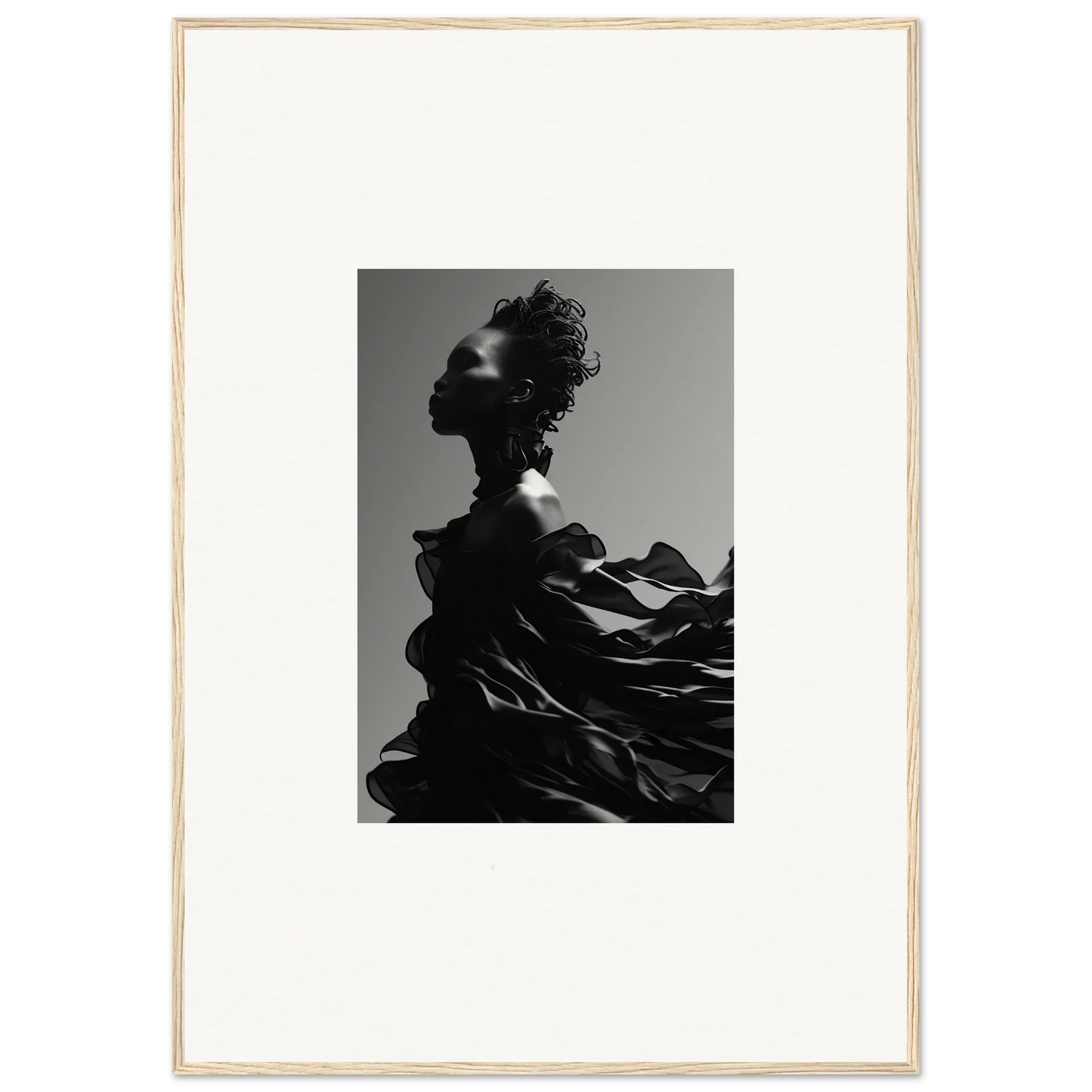 Dramatic black-and-white silhouette of a figure with flowing, billowing fabric.