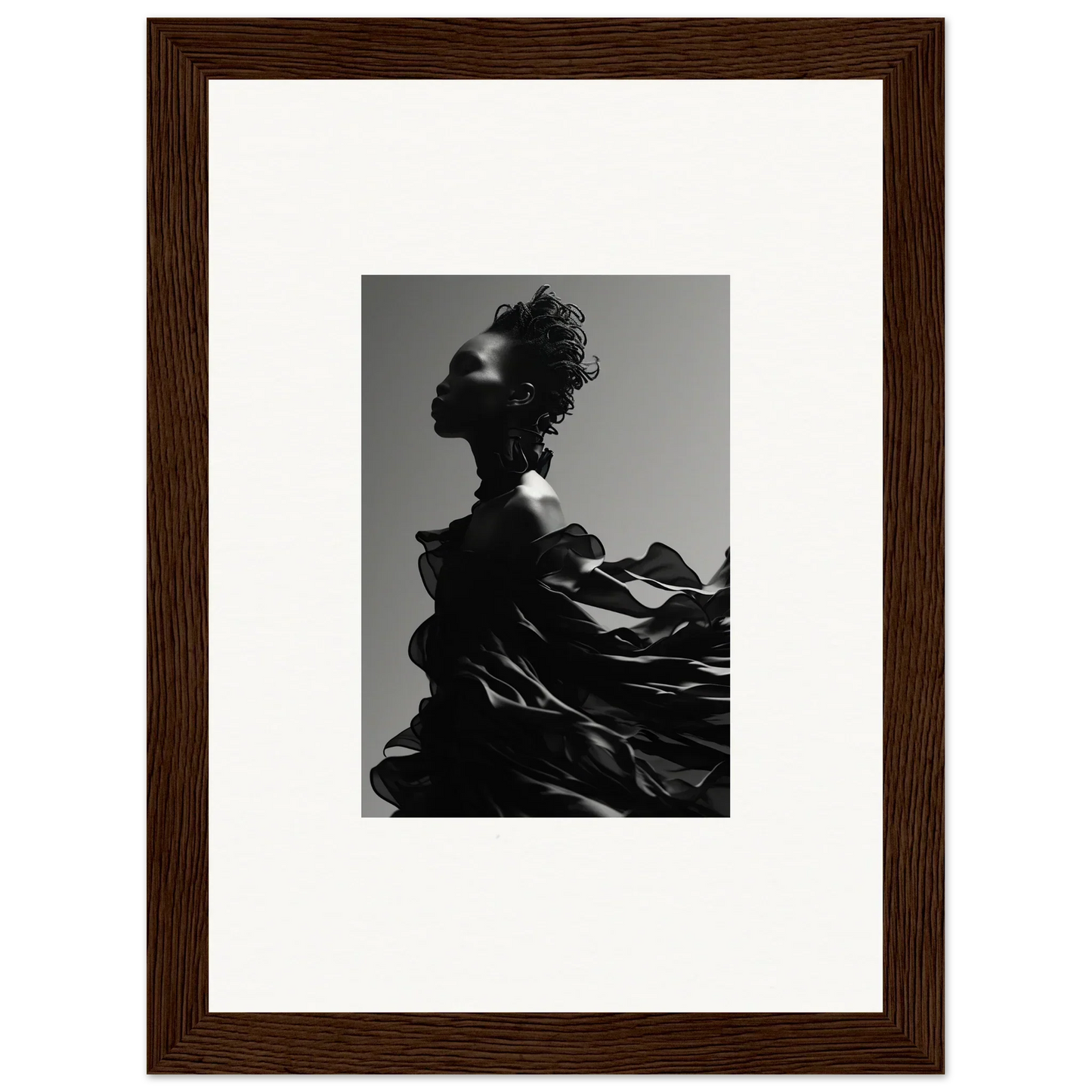 Striking black and white portrait of a figure with dramatic, flowing fabric.