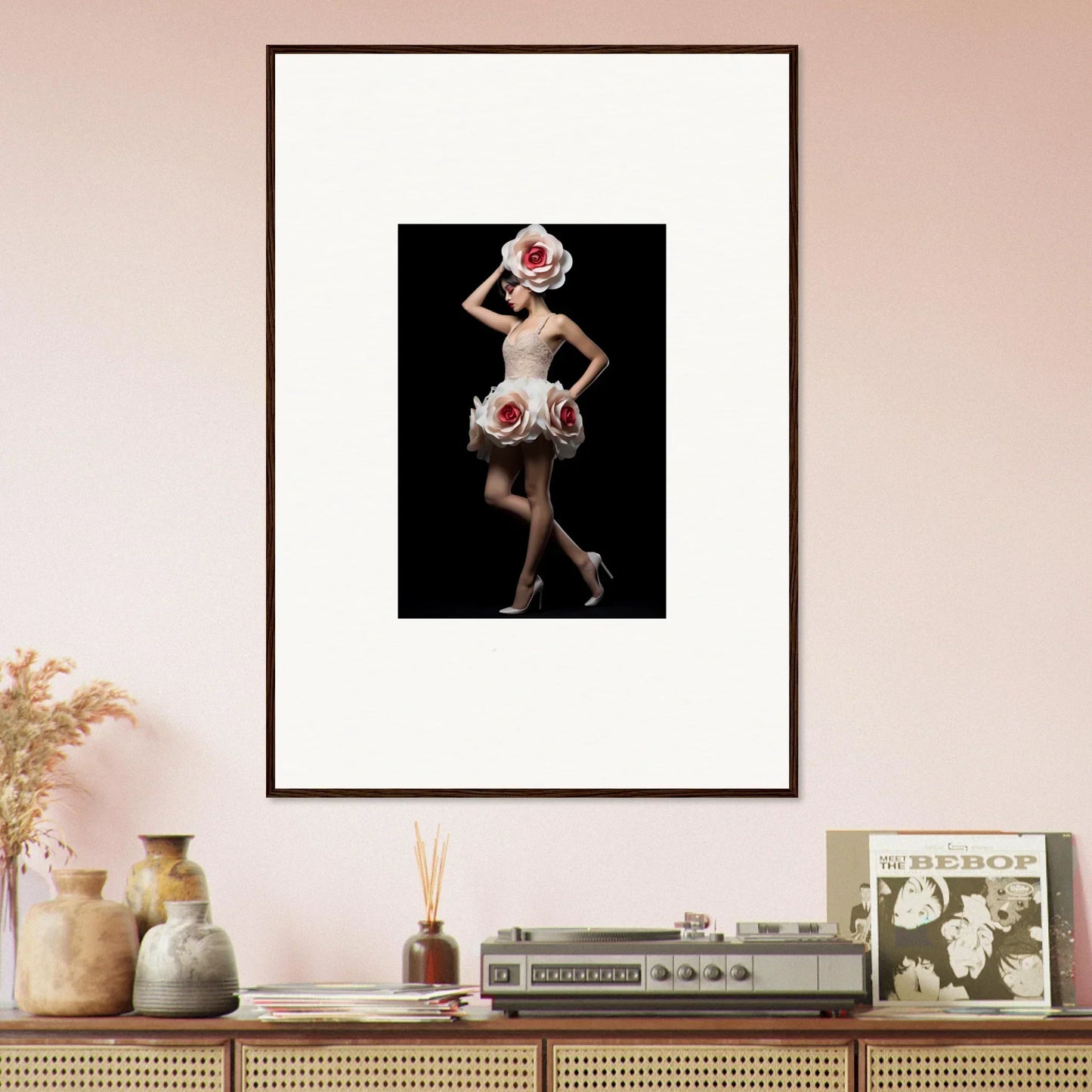 Framed wall art of a dancer in white dress with red accents for vibrant room decor