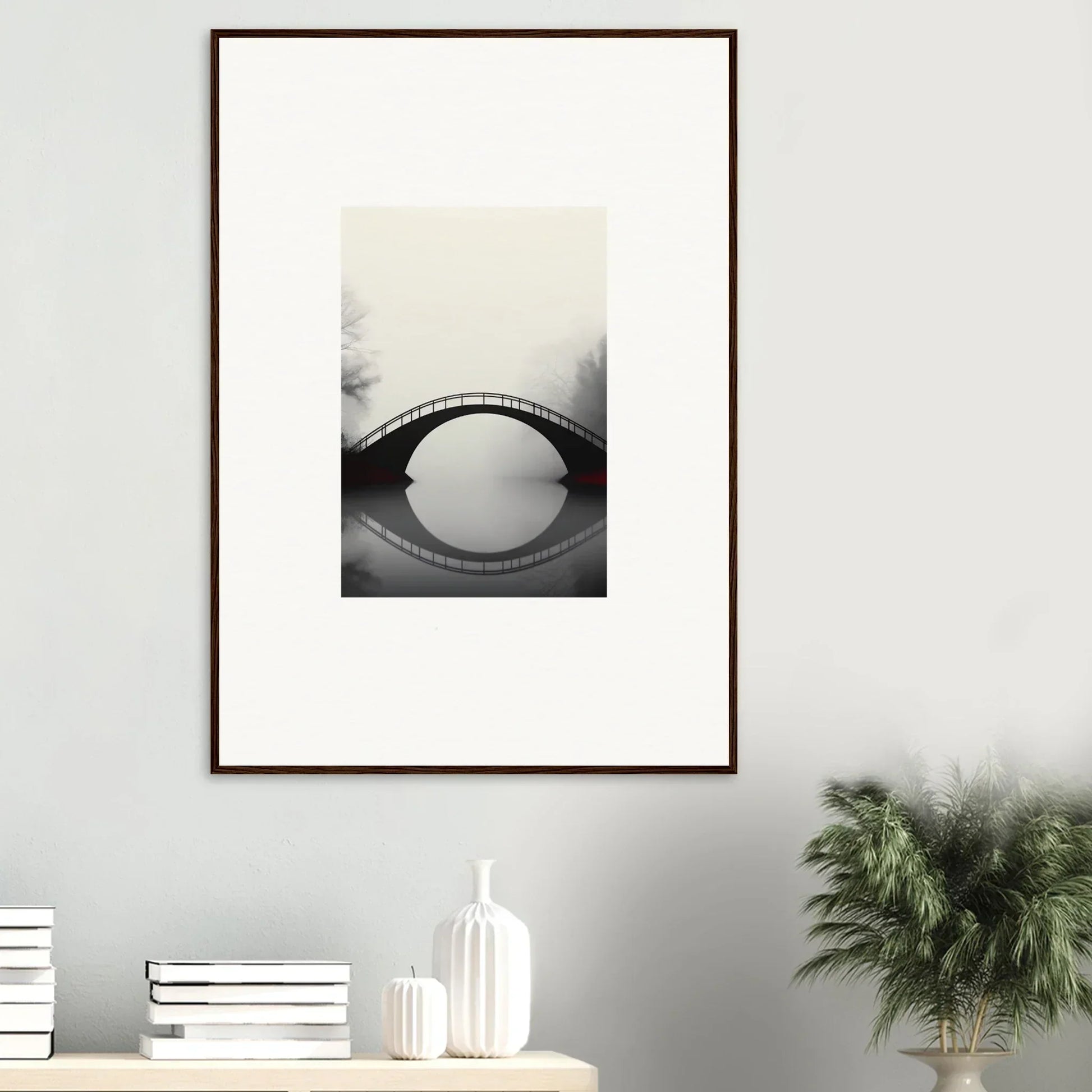 Framed black and white canvas print of an arched bridge reflecting in still water for room decoration