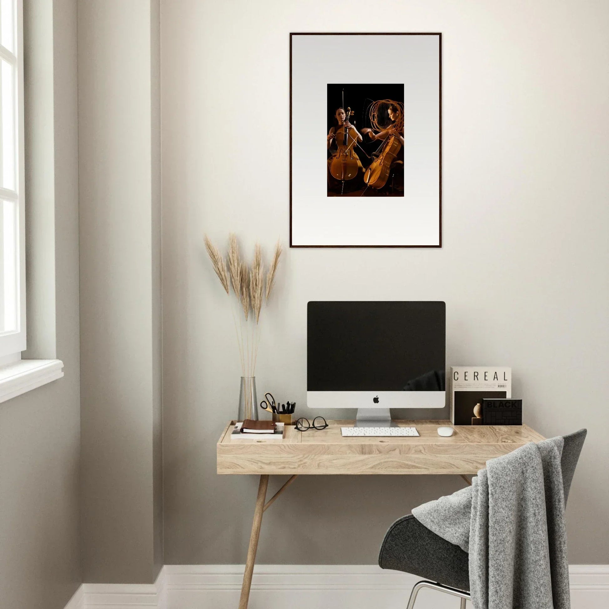 Minimalist wooden desk with computer monitor, enhancing room decor and canvas prints