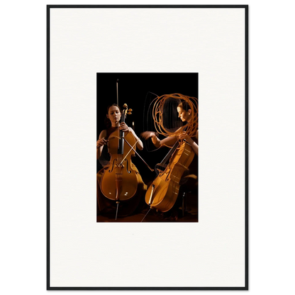 Framed wall art of two cellists performing with dramatic lighting for stylish room decor