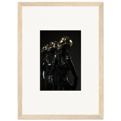 Framed artwork depicting dark, shadowy figures in a dramatic pose.