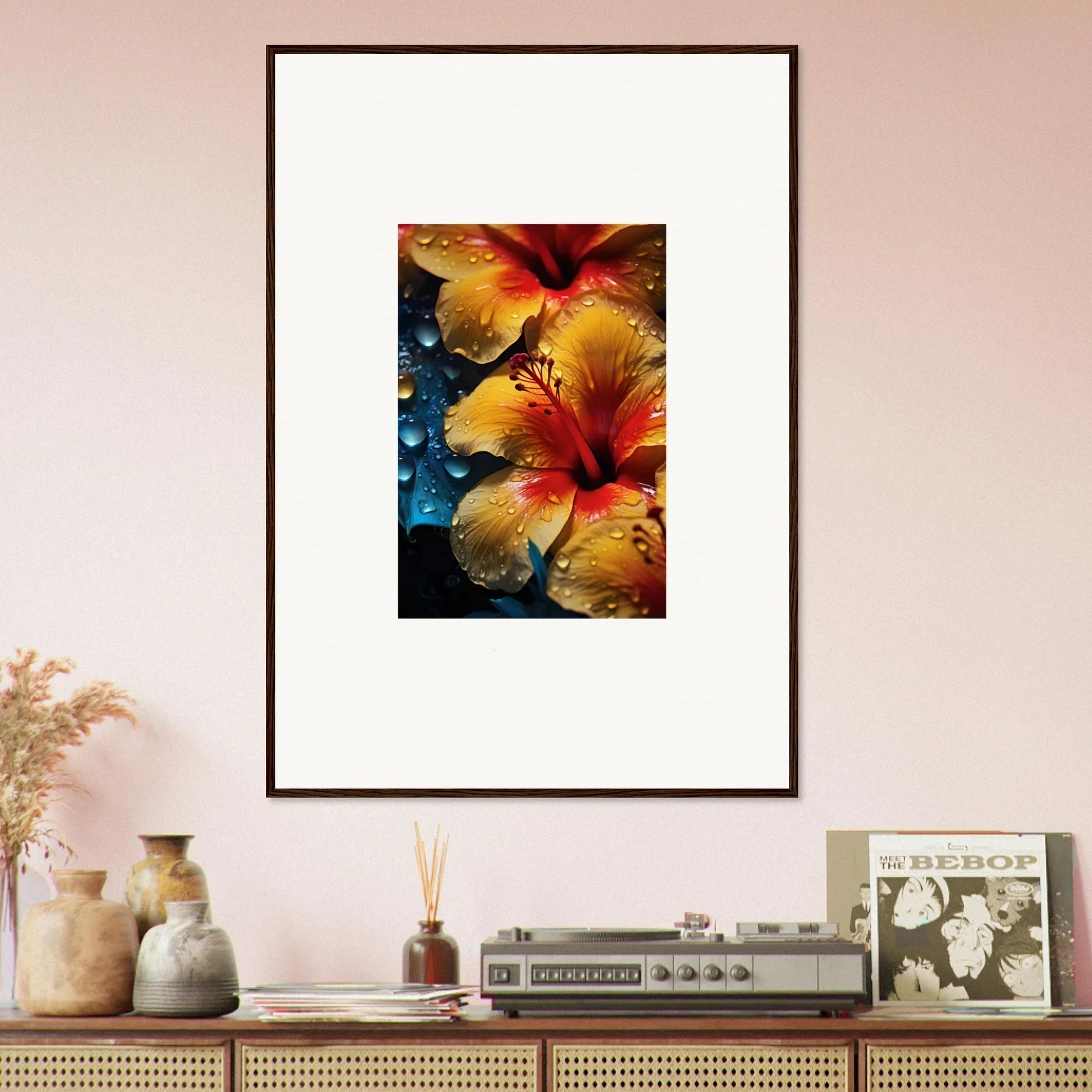 Framed artwork of vibrant red and yellow hibiscus in Echoing Sun Chorus special edition art™