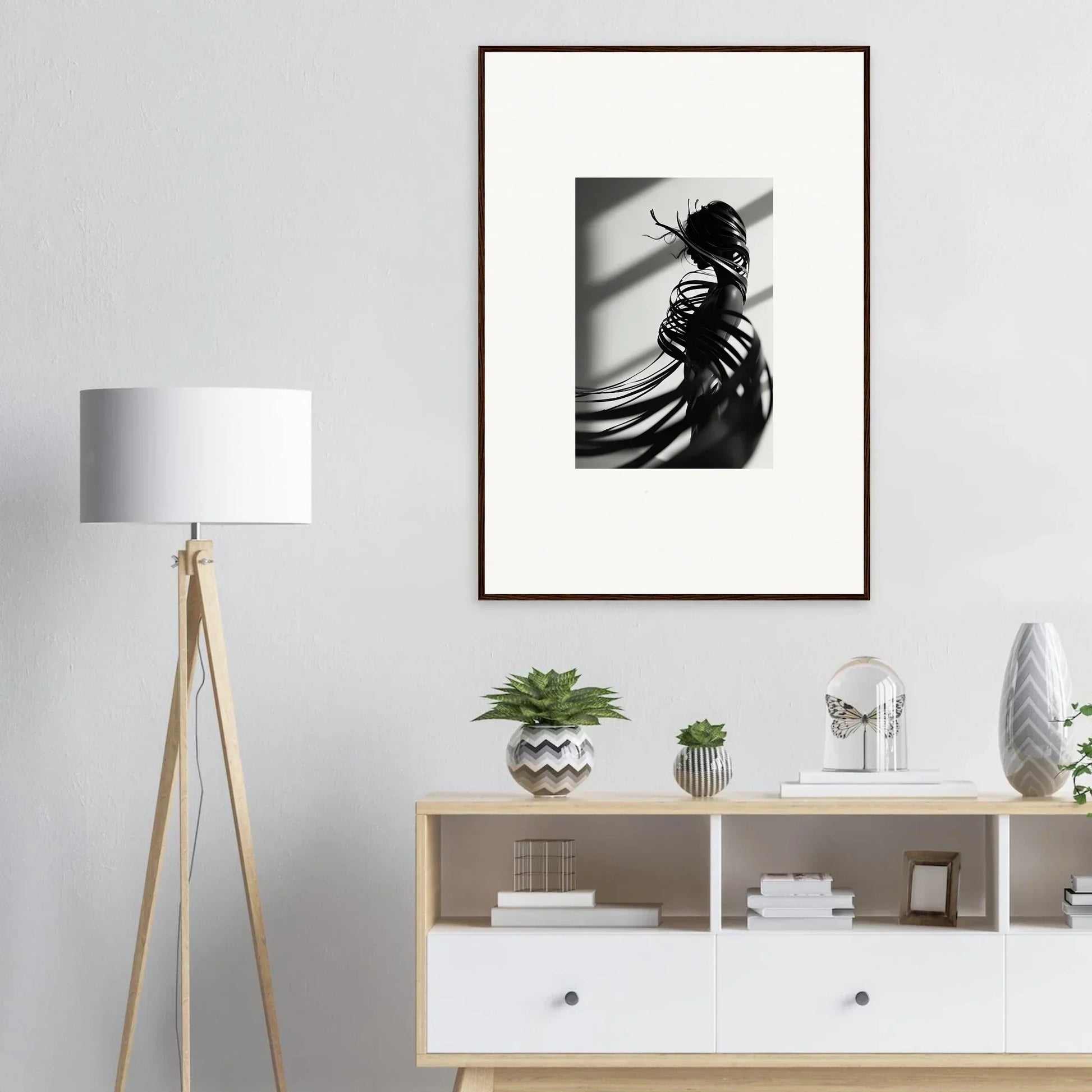 Framed black and white photo of a silhouetted figure, perfect for serpentine harmony room decoration