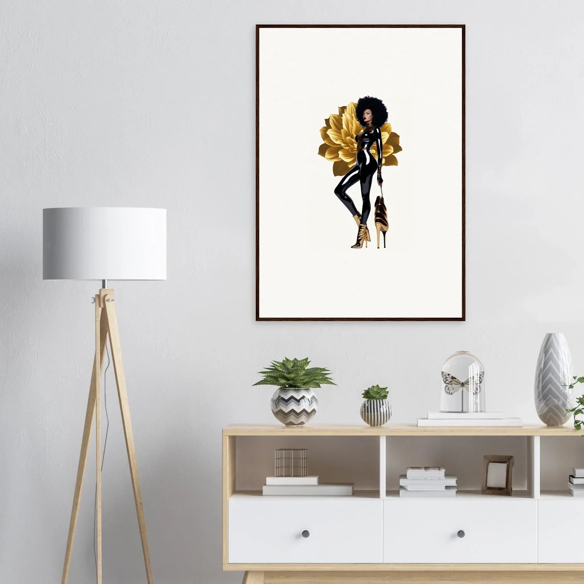 Framed wall art of a stylized figure with golden wings, ideal for golden reverie room decor