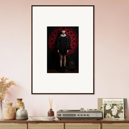 Framed wall art featuring a dark figure in bold red, perfect for Ecstasy Velvet Corsetry