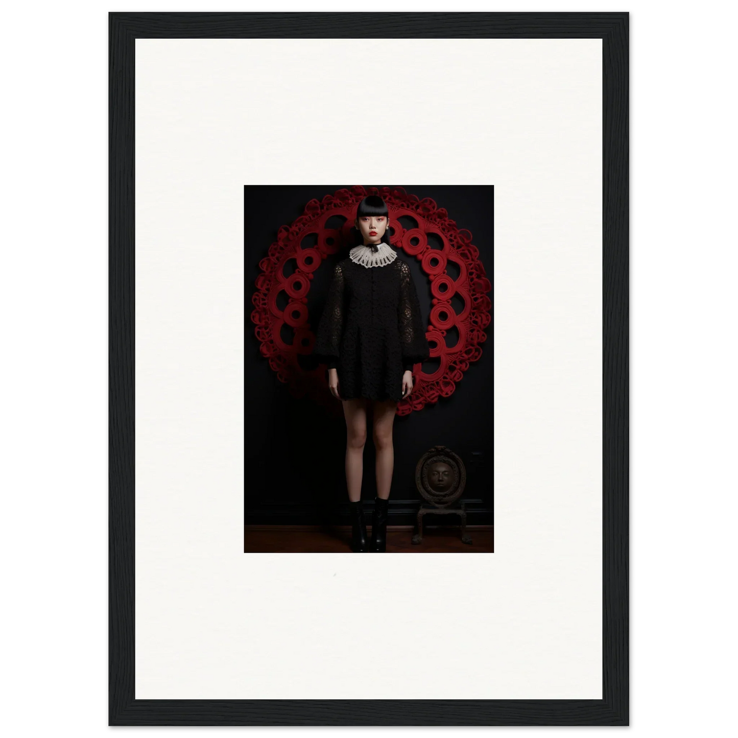 Framed wall art featuring a dark figure on a bold red pattern from Ecstasy. Velvet. Corsetry