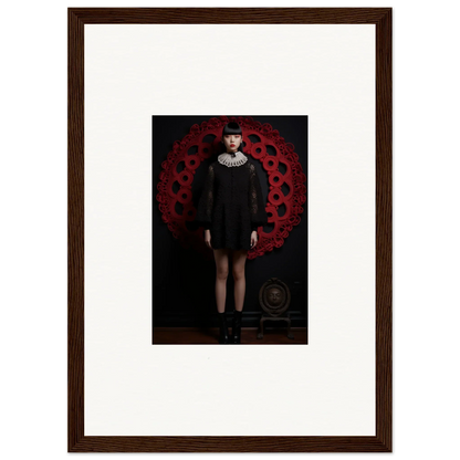 Framed wall art of a figure in a black dress with a white ruffled collar in Ecstasy