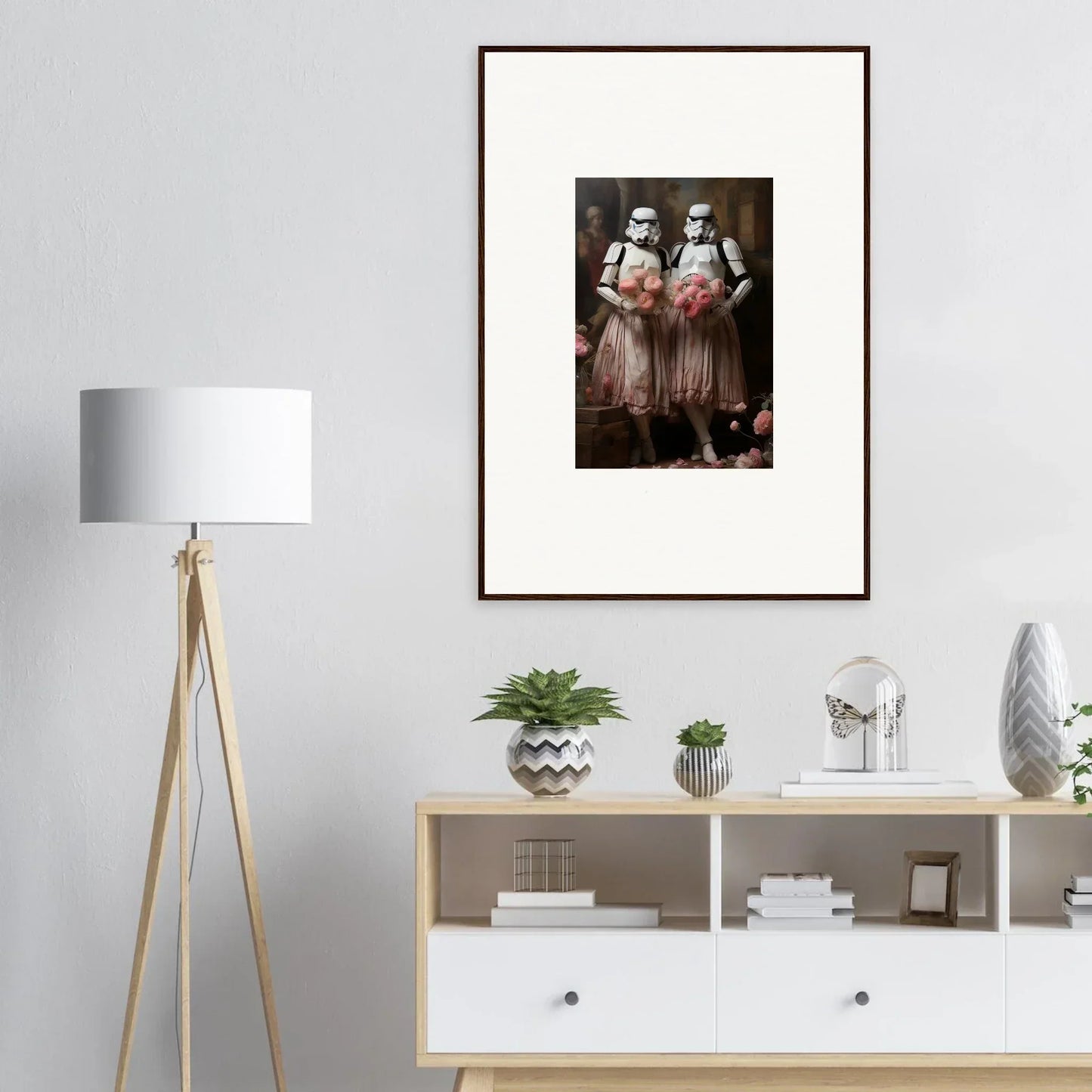 Framed wall art of Stormtroopers in pink tutus, perfect for unique room decor amidst echoes