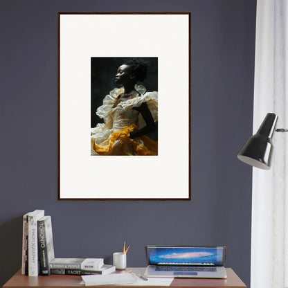 Framed wall art of a person in white top and yellow skirt, ideal for room decor