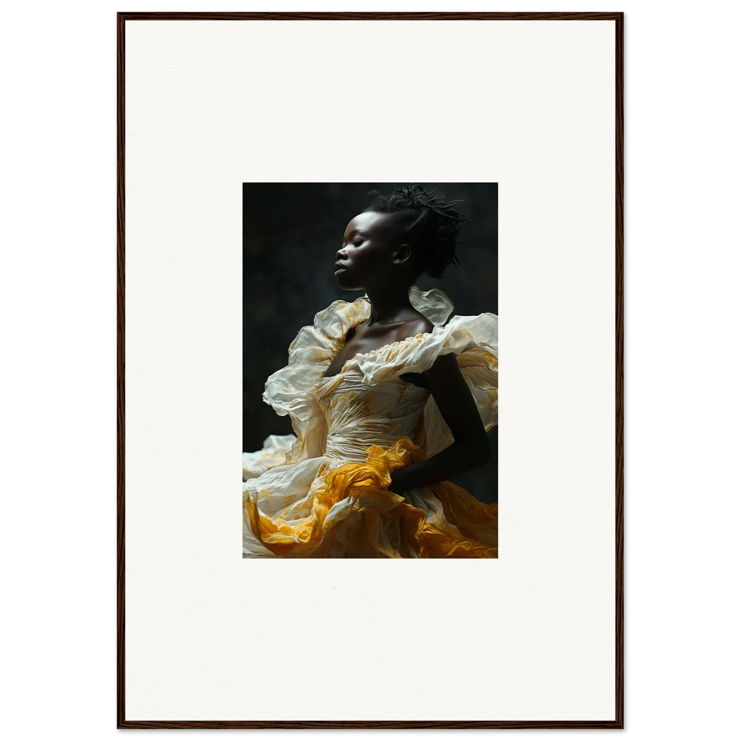 Framed wall art of a person in a flowing white and yellow garment, eclipsed fluttering