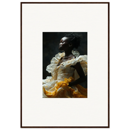 Framed wall art of a person in a flowing white and yellow garment, eclipsed fluttering