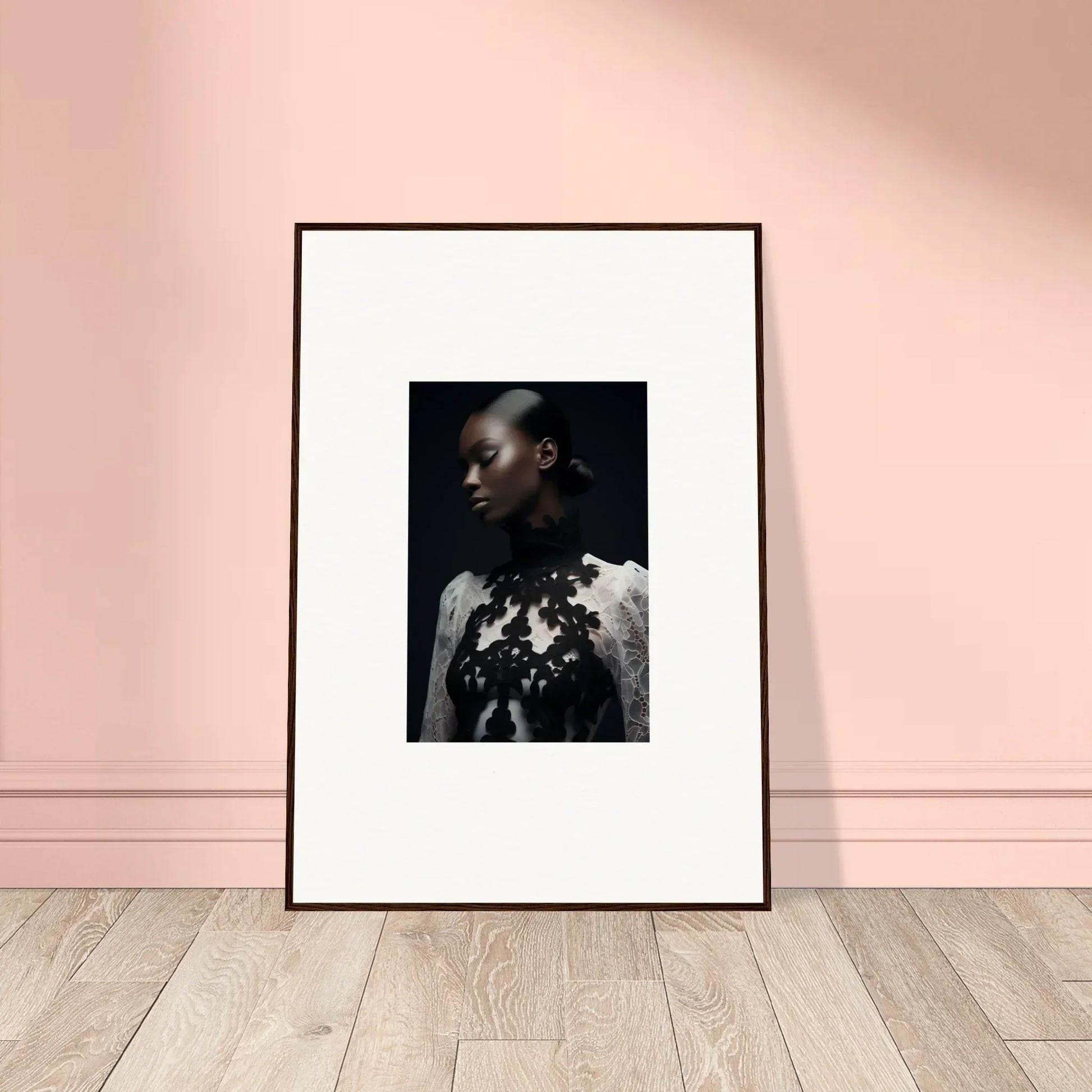 Framed wall art of a person in a white garment with floral accents for room decor