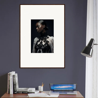 Framed wall art of a person in white top with dark floral design for stylish room decor