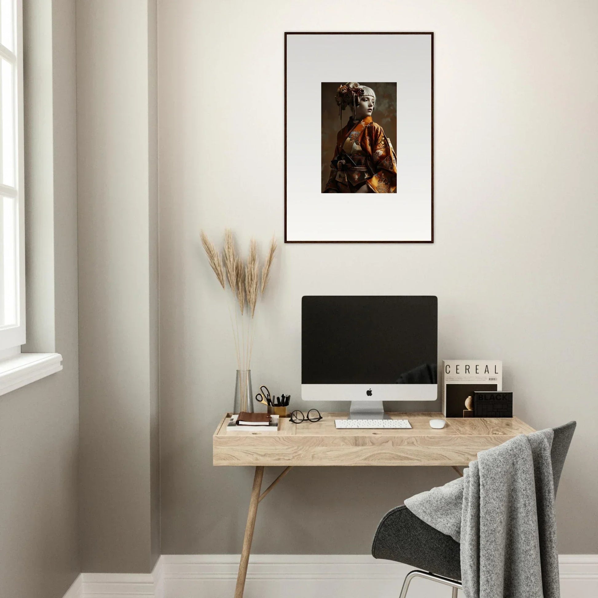 Minimalist wooden desk with computer monitor and Night Blossom framed wall art