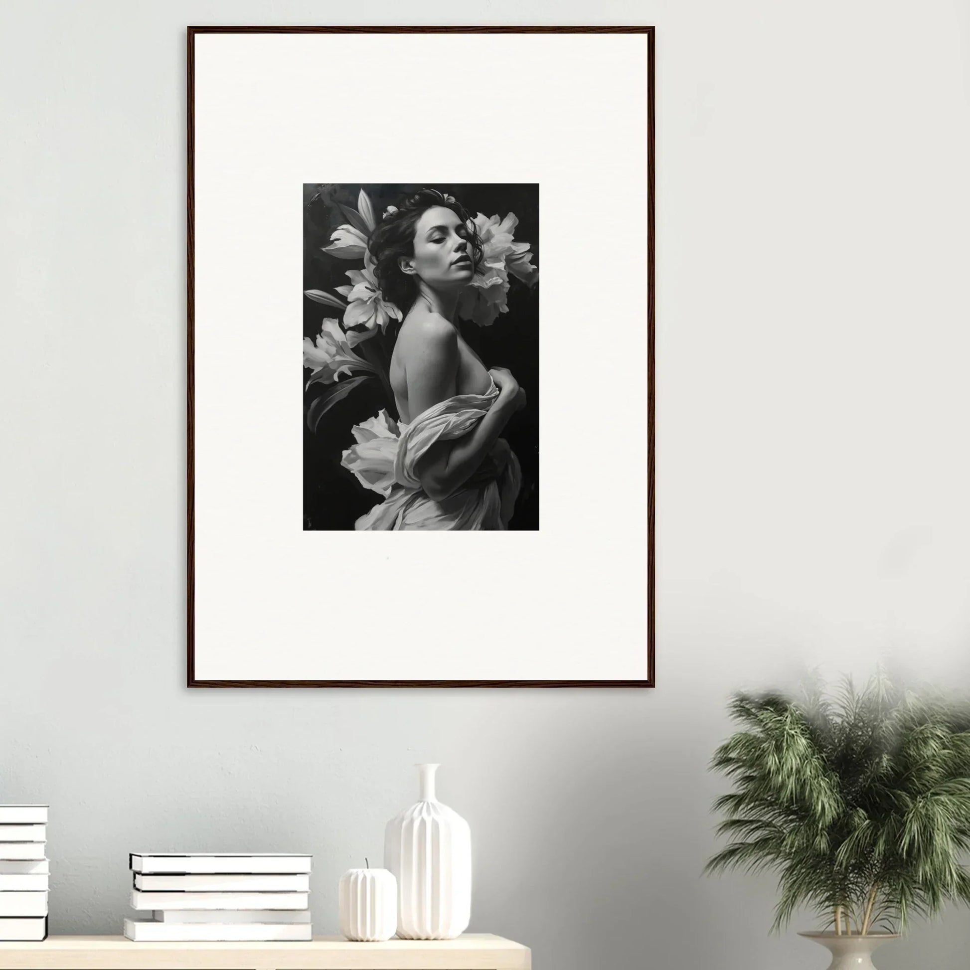 Framed black and white photograph of a woman with flowers, perfect for vineyard enigma room decor