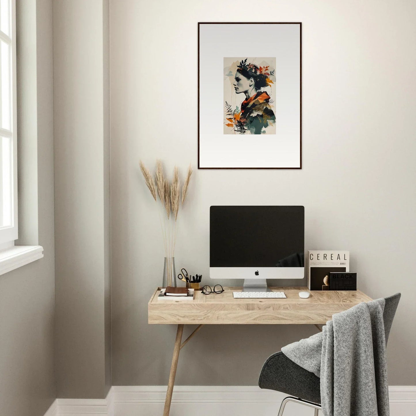 Minimalist home office with wooden desk, computer, and stylish wall art for room decoration