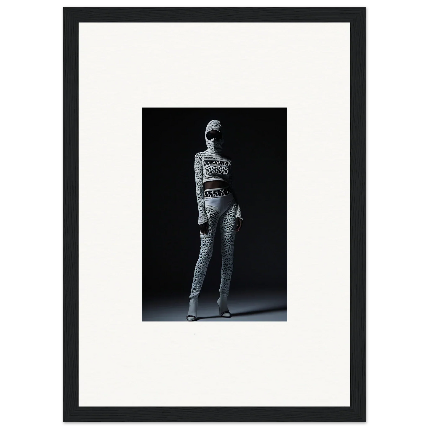 Black and white photo of a person in a patterned top, ideal for Chic Mirage wall art