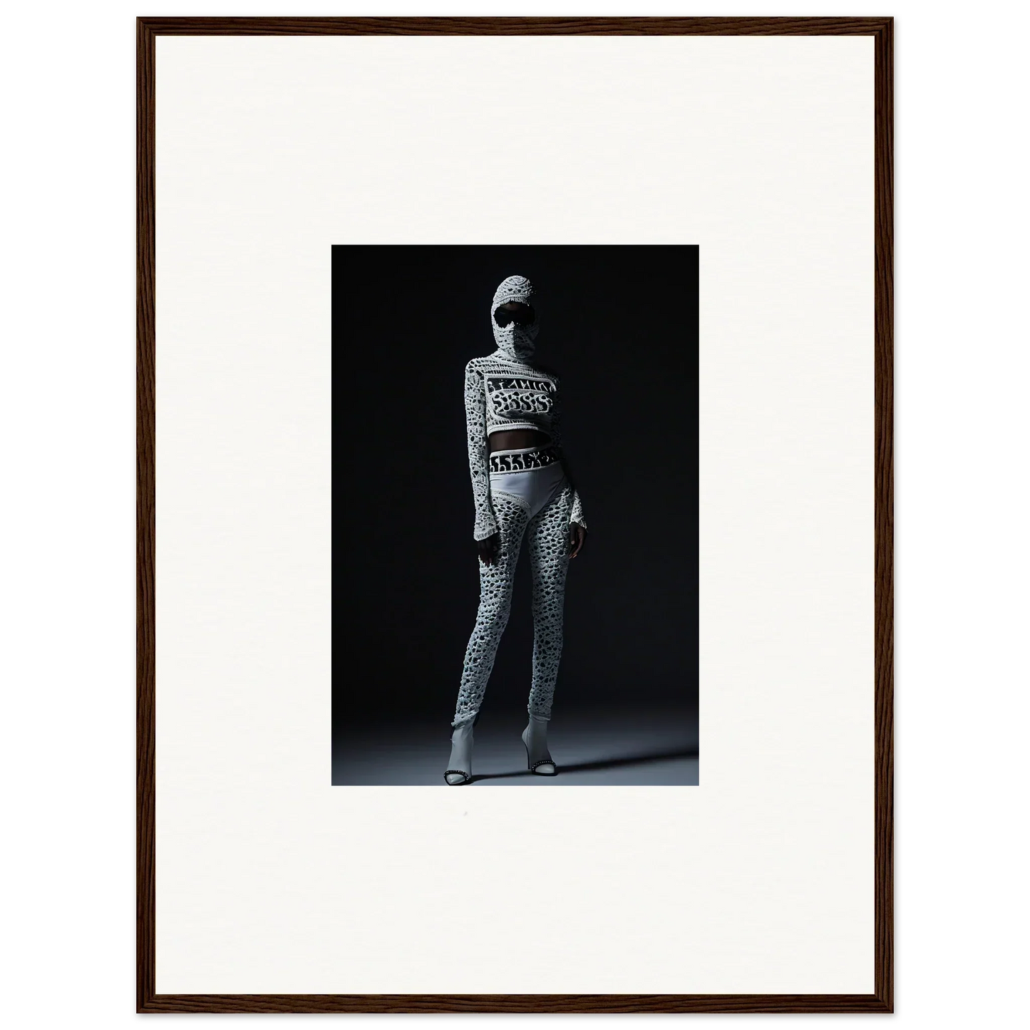 Black and white photo of a person in a patterned bodysuit for chic mirage wall art