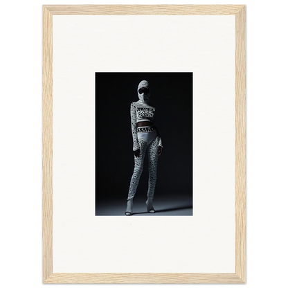 Black and white photo of a person in patterned outfit for chic mirage framed wall art